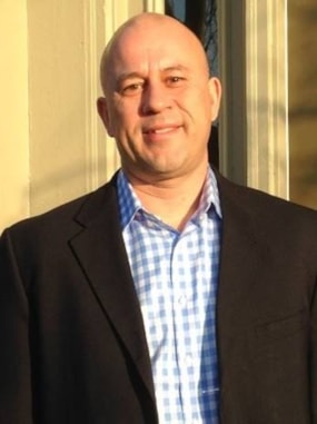 Headshot of Greg Thomson, owner of RSVP Lexington